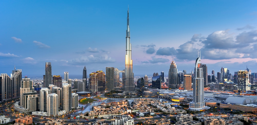 Photo of the Dubai skyline. Burj Khalifa in the middle of the photo. 