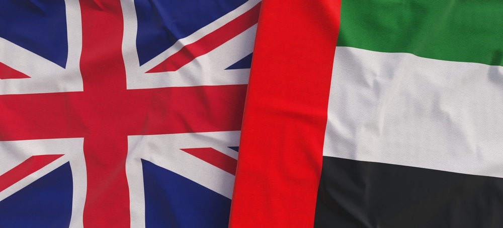 Great Britain flag and the UAE flag side by side. 